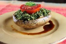 Raw Portobello Mushroom Stuffed with Basil Pesto Photo