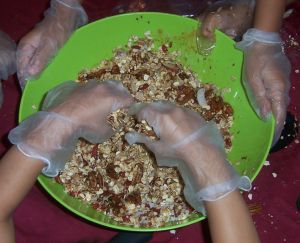 kids making granola