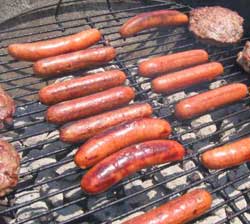 hot dogs grilling