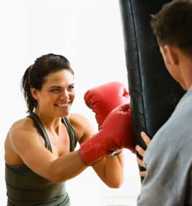 woman punching bag