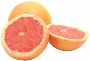 whole and sliced grapefruits