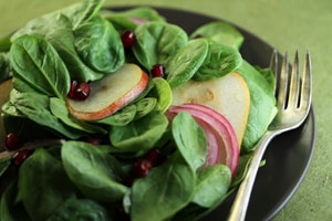 Spinach Salad with Pears and Pomegranate Photo